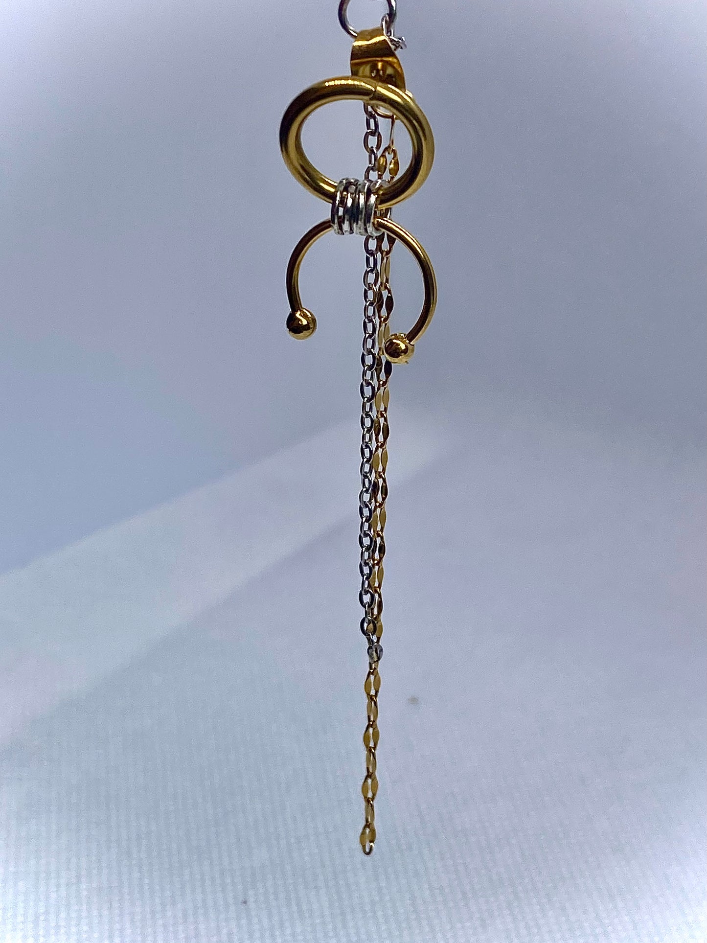 Page of Swords mono-earring