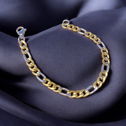 A bracelet with alternating gold and silver stainless steel links, displayed on a dark fabric background.