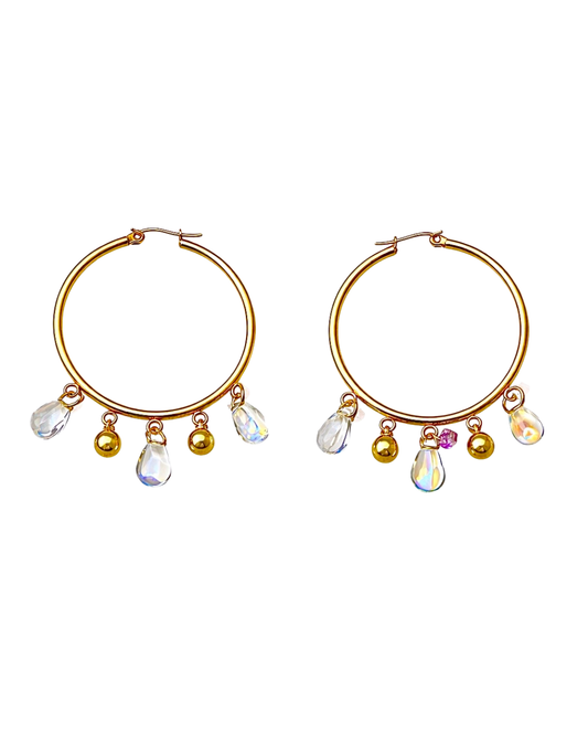 Gold hoop earrings with colorful beads on a white background