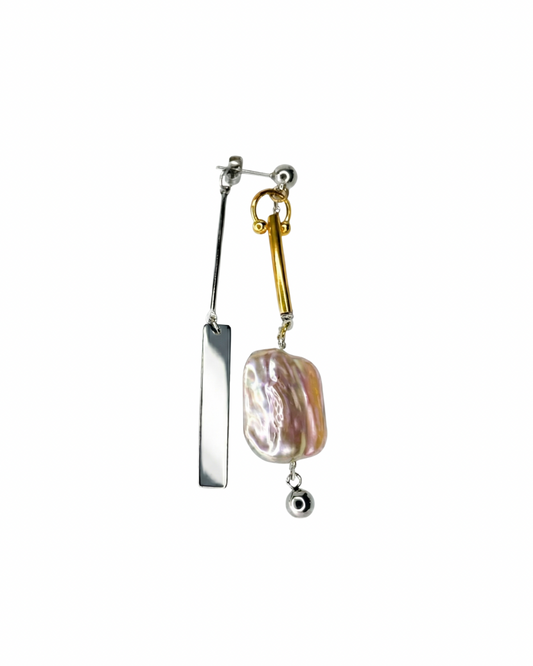 Pair of earrings with a gold and silver design on a white background