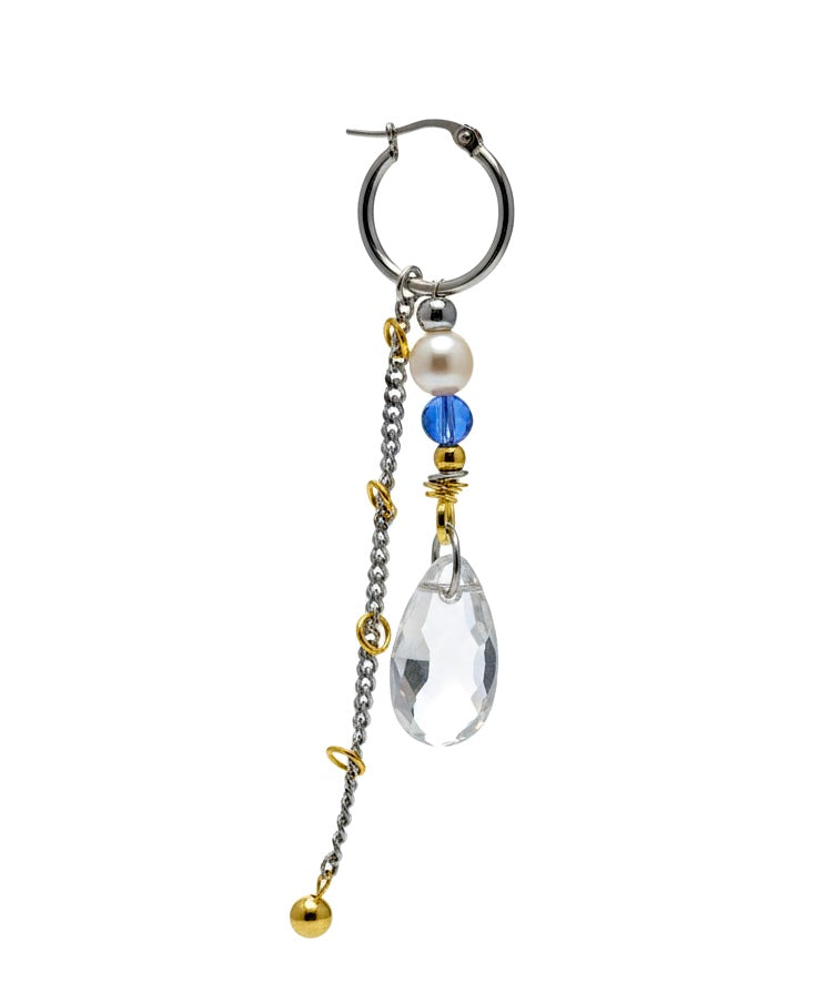 Earring with beads and chain on a white background